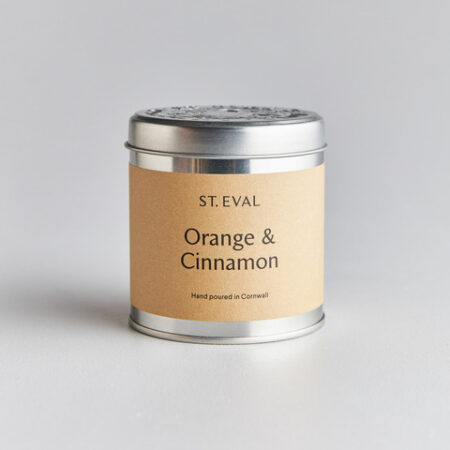 Orange and Cinnamon scented candle in a tin