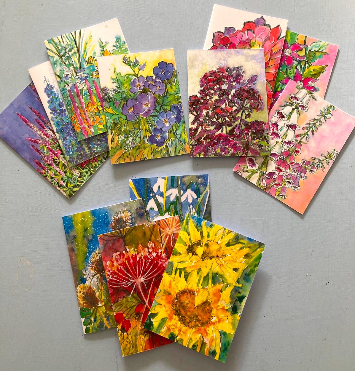 Greetings cards packs of eight in a choice of flower designs
